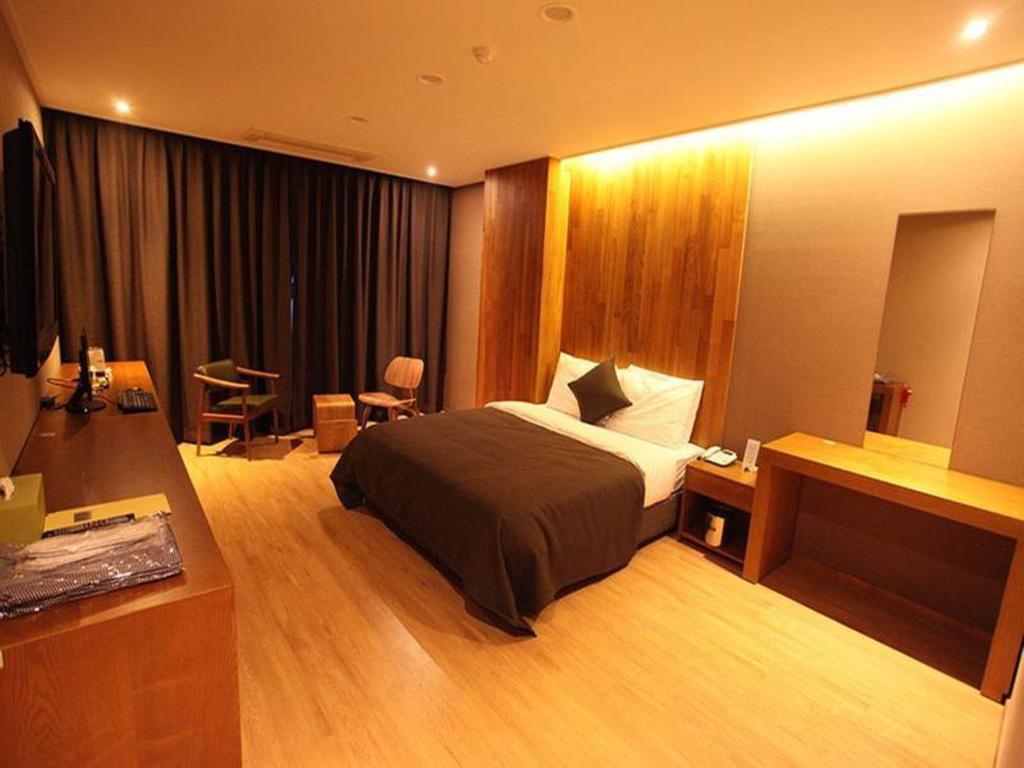 Hotel Rich Коян Номер фото
